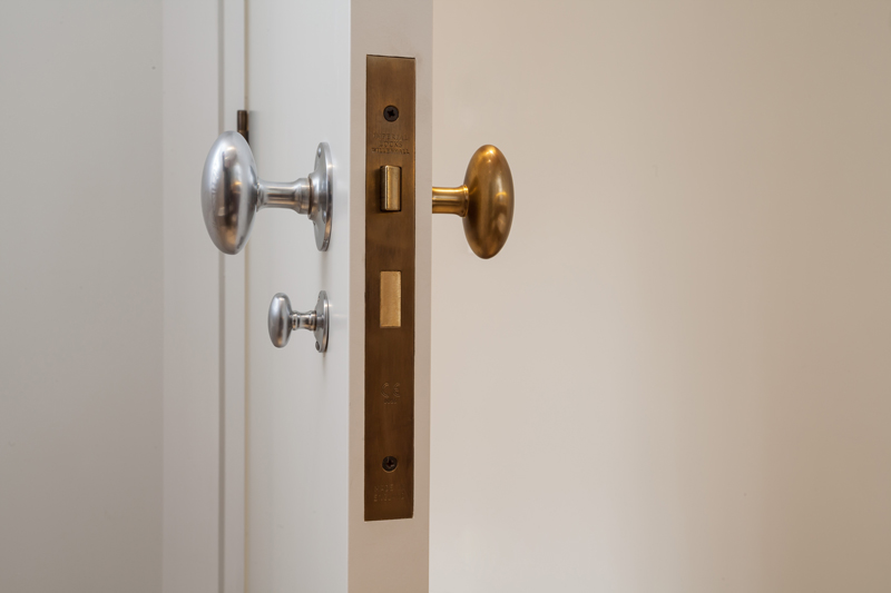 Silver And Gold Door Bathroom Door Knobs In Drury Lane Residence