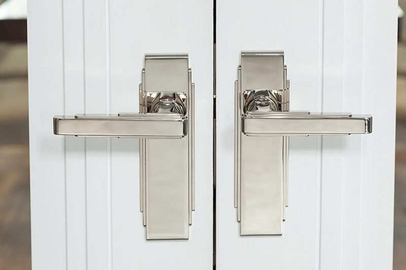 Symmetrical Silver Door Handles On Double Doors