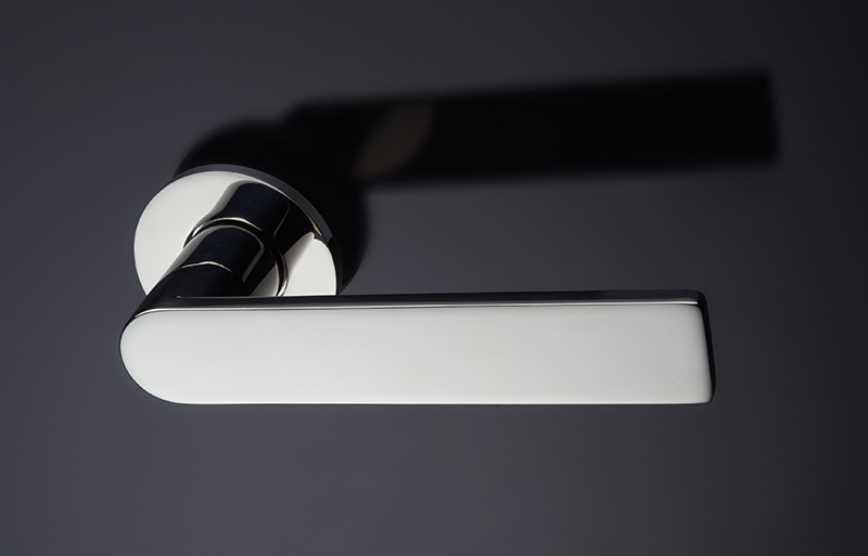 Silver Ironmongery handle for doors on black door