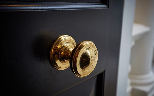 Bespoke Gold Knob On Black Door